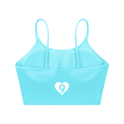 Light blue sports bra with a heart and number 9 logo on a white background