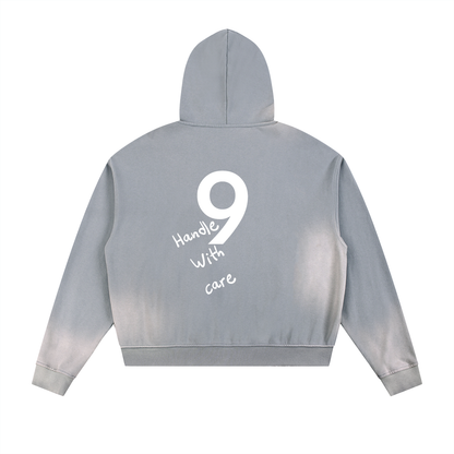 Gray hoodie with a number 9 and text on the back against a white background