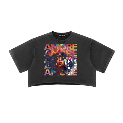 Black crop top with colorful 'AMORE' graphic on a white background